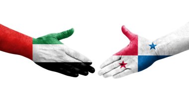 Panama ve BAE bayrakları arasındaki tokalaşma elleri boyalı, izole şeffaf görüntü.