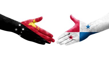 Panama ve Papua Yeni Gine bayrakları arasındaki el sıkışma ellerinde izole şeffaf görüntü.