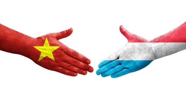 Handslag Mellan Luxemburg Och Vietnam Flaggor Målade Händer Isolerad Transparent — Stockfoto