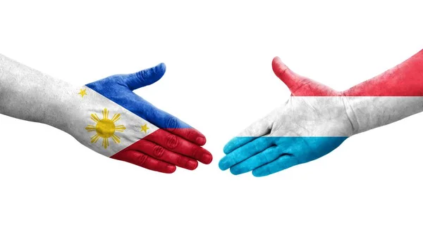 Potřesení Rukou Mezi Lucemburskými Filipínskými Vlajkami Namalovanými Rukou Izolovaný Průhledný — Stock fotografie