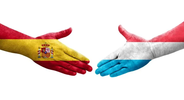 stock image Handshake between Luxembourg and Spain flags painted on hands, isolated transparent image.