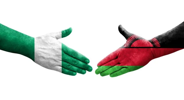 Uścisk Dłoni Między Malawi Nigerii Flagi Malowane Rękach Odizolowany Przezroczysty — Zdjęcie stockowe