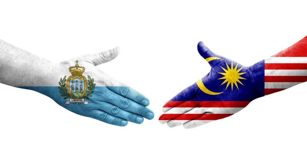Aperto Mão Entre Malásia São Marinho Bandeiras Pintadas Mãos Imagem — Fotografia de Stock