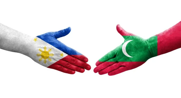 Uścisk Dłoni Między Malediwami Filipinami Flagi Malowane Rękach Odizolowany Przezroczysty — Zdjęcie stockowe