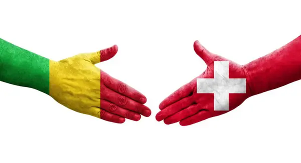 Uścisk Dłoni Między Mali Szwajcarią Flagi Malowane Rękach Odizolowany Przezroczysty — Zdjęcie stockowe