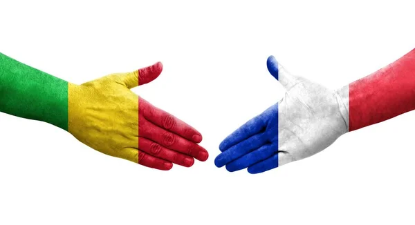 手に描かれたマリとフランスの旗の間の握手 孤立した透明なイメージ — ストック写真