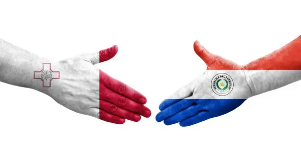 stock image Handshake between Malta and Paraguay flags painted on hands, isolated transparent image.