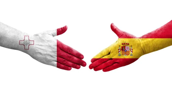 手に描かれたマルタとスペインの旗の間の握手 孤立した透明なイメージ — ストック写真