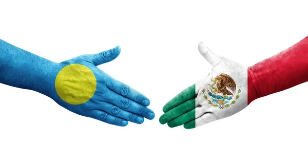 Händedruck Zwischen Mexiko Und Palau Flaggen Auf Händen Gemalt Isoliertes — Stockfoto