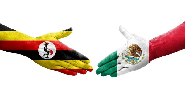 Mano Apretada Entre México Uganda Banderas Pintadas Las Manos Imagen — Foto de Stock