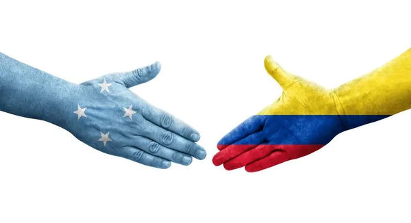 密克罗尼西亚和哥伦比亚之间的握手 手绘国旗 孤立透明的图像 — 图库照片
