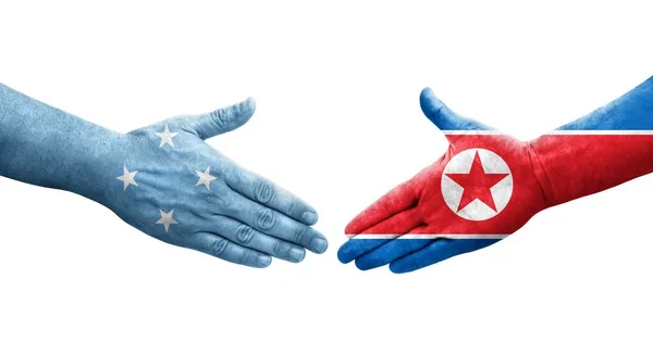 Рукопожатие Между Флагами Микронезии Северной Кореи Нарисованное Руках Изолированное Прозрачное — стоковое фото