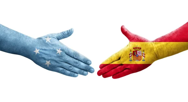 密克罗尼西亚和西班牙国旗之间的握手手绘 孤立透明的图像 — 图库照片