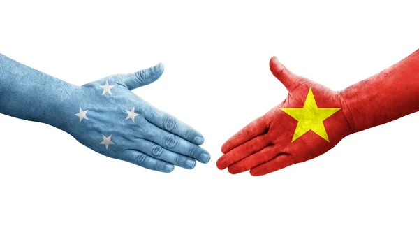 Рукостискання Між Мікронезією Прапорами Єтнаму Намальоване Руках Ізольоване Прозоре Зображення — стокове фото