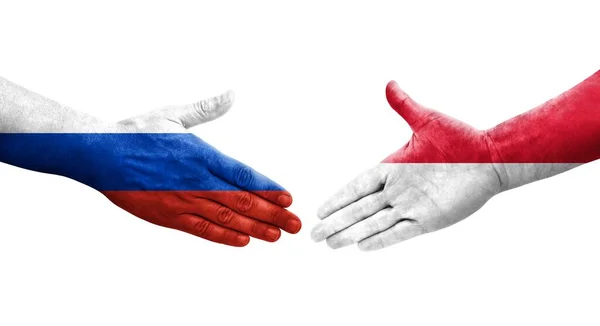 Handdruk Tussen Monaco Rusland Vlaggen Handen Geschilderd Geïsoleerd Transparant Beeld — Stockfoto