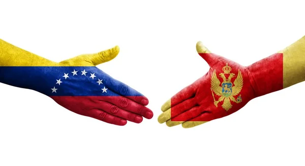 モンテネグロとベネズエラの旗の間の握手手で描かれ 隔離された透明画像 — ストック写真