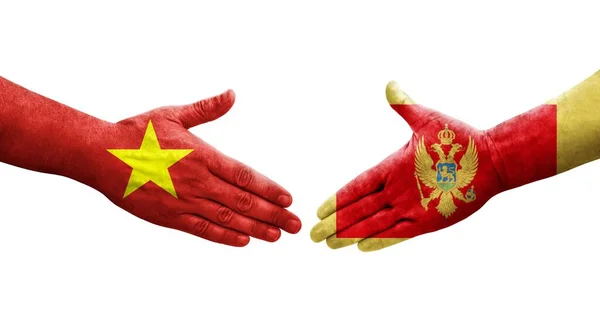 Handshake Entre Montenegro Vietnã Bandeiras Pintadas Mãos Imagem Transparente Isolada — Fotografia de Stock