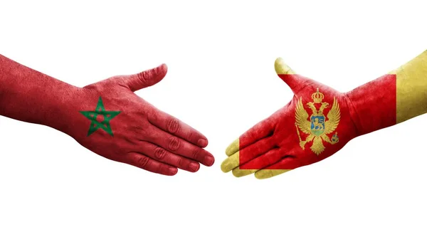 Apretón Manos Entre Montenegro Marruecos Banderas Pintadas Las Manos Imagen — Foto de Stock