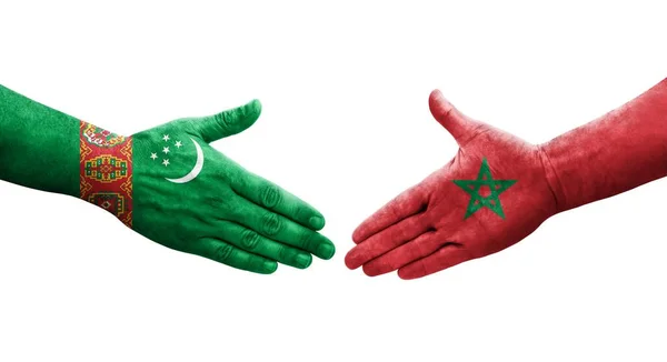 Apretón Manos Entre Marruecos Turkmenistán Banderas Pintadas Las Manos Imagen — Foto de Stock