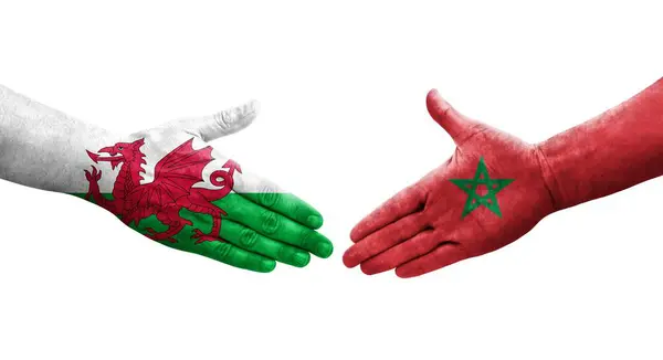 Apretón Manos Entre Marruecos Gales Banderas Pintadas Las Manos Imagen — Foto de Stock