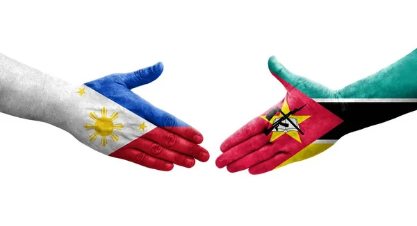 Handslag Mellan Moçambique Och Filippinerna Flaggor Målade Händer Isolerad Transparent — Stockfoto