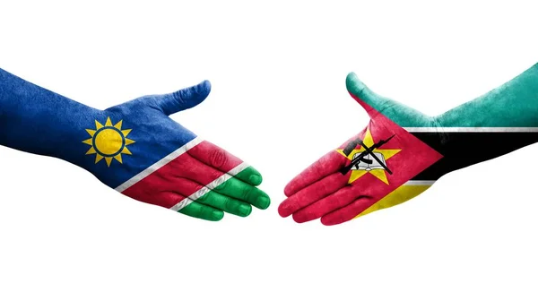Aperto Mão Entre Moçambique Namíbia Bandeiras Pintadas Mãos Imagem Transparente — Fotografia de Stock