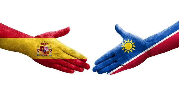 비아와 스페인의 국기를 손으로 만지작 거리며 분리되어 이미지 — 스톡 사진