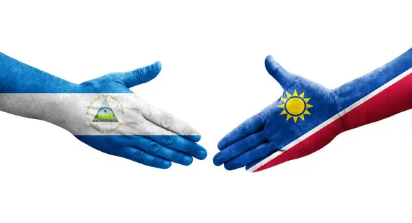 纳米比亚和尼加拉瓜之间握手 手绘国旗 孤立透明的图像 — 图库照片