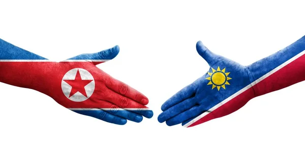 Aperto Mão Entre Namíbia Coreia Norte Bandeiras Pintadas Mãos Imagem — Fotografia de Stock