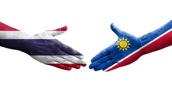 Händedruck Zwischen Namibia Und Thailand Flaggen Auf Hände Gemalt Isoliertes — Stockfoto