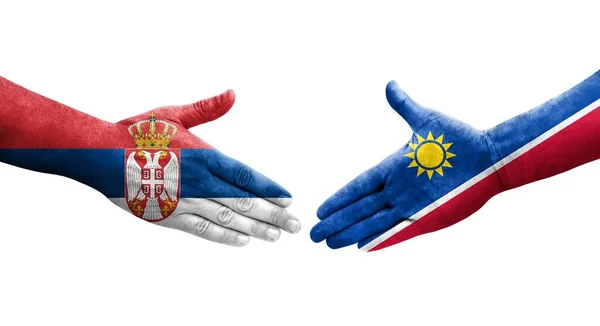Händedruck Zwischen Den Flaggen Namibias Und Serbiens Auf Hände Gemalt — Stockfoto