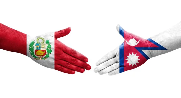 手に描かれたネパールとペルーの旗の間の握手 孤立した透明なイメージ — ストック写真
