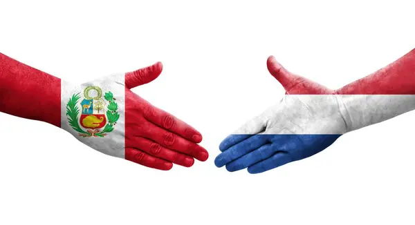 Χειραψία Μεταξύ Κάτω Χωρών Και Περού Σημαίες Ζωγραφισμένα Στα Χέρια — Φωτογραφία Αρχείου
