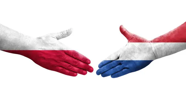 네덜란드와 폴란드의 국기가 손으로 그려지고 고립된 이미지를 가지고 악수를 — 스톡 사진