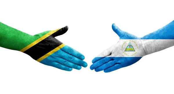 Aperto Mão Entre Nicarágua Bandeiras Tanzânia Pintadas Mãos Imagem Transparente — Fotografia de Stock