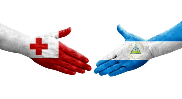 Handshake Nicaragua Tonga Flags Painted Hands Isolated Transparent Image — Stock Photo, Image