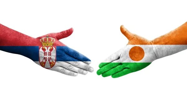 Χειραψία Μεταξύ Νίγηρα Και Σερβίας Σημαίες Ζωγραφισμένες Χέρια Απομονωμένη Διαφανής — Φωτογραφία Αρχείου