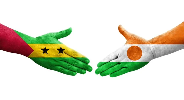 Handdruk Tussen Niger Sao Tomé Principe Vlaggen Geschilderd Handen Geïsoleerd — Stockfoto