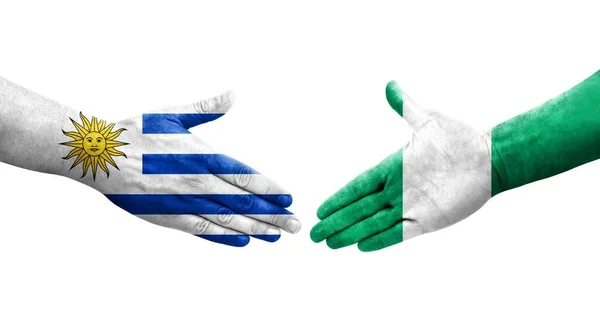 Aperto Mão Entre Nigéria Bandeiras Uruguai Pintadas Mãos Imagem Transparente — Fotografia de Stock