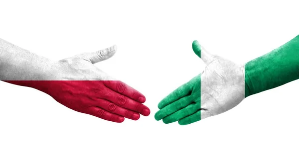 Apretón Manos Entre Nigeria Polonia Banderas Pintadas Las Manos Imagen — Foto de Stock