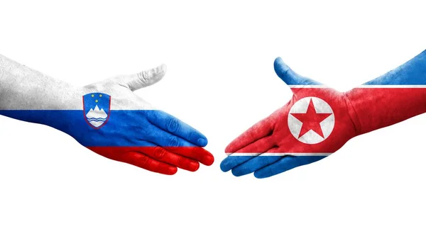 Aperto Mão Entre Coreia Norte Eslovénia Bandeiras Pintadas Mãos Imagem — Fotografia de Stock