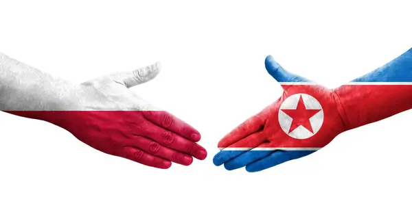 Uścisk Dłoni Między Koreą Północną Polską Malowane Rękach Flagi Odizolowany — Zdjęcie stockowe