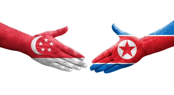 Aperto Mão Entre Coreia Norte Singapura Bandeiras Pintadas Mãos Imagem — Fotografia de Stock