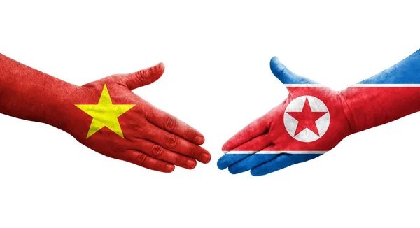Рукостискання Між Північною Кореєю Єтнамськими Прапорами Намальоване Руках Ізольоване Прозоре — стокове фото