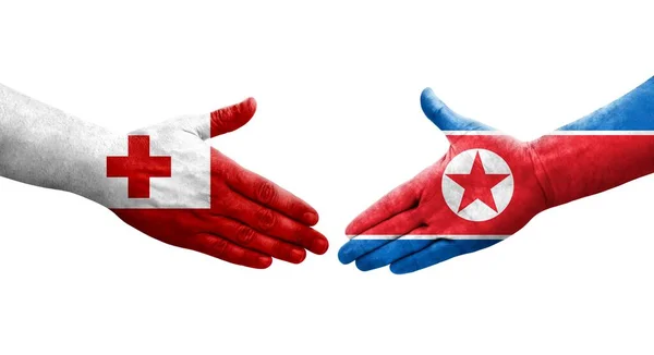 Aperto Mão Entre Coreia Norte Bandeiras Tonga Pintadas Mãos Imagem — Fotografia de Stock