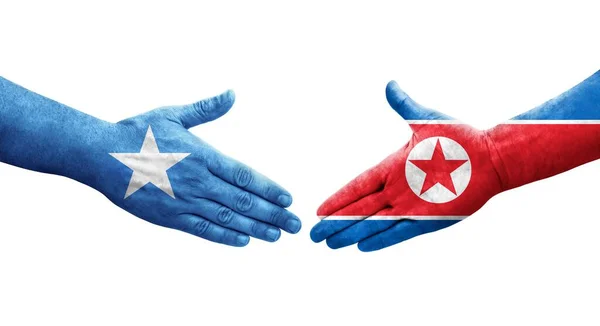 Mano Apretada Entre Corea Del Norte Somalia Banderas Pintadas Las —  Fotos de Stock