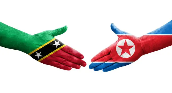 Händedruck Zwischen Nordkorea Und Kitts Und Nevis Flaggen Auf Händen — Stockfoto