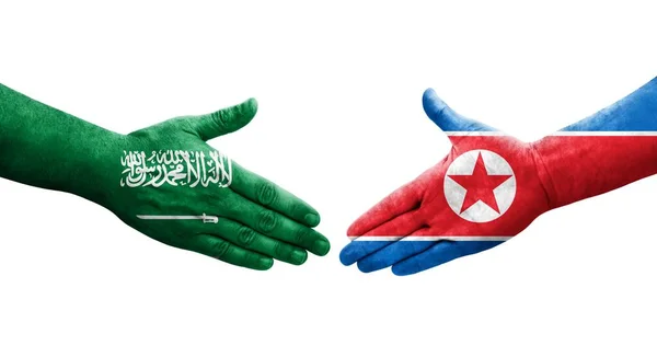 Aperto Mão Entre Coreia Norte Arábia Saudita Bandeiras Pintadas Mãos — Fotografia de Stock