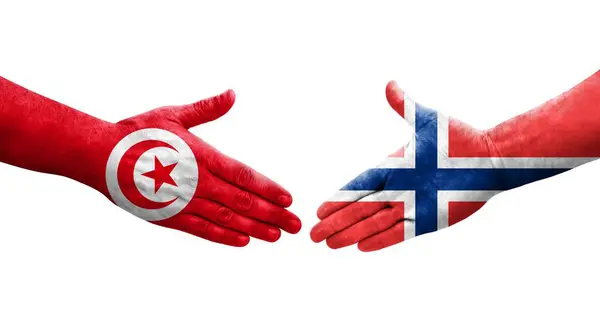 Рукостискання Між Норвегією Тунісом Прапори Намальовані Руках Ізольоване Прозоре Зображення — стокове фото