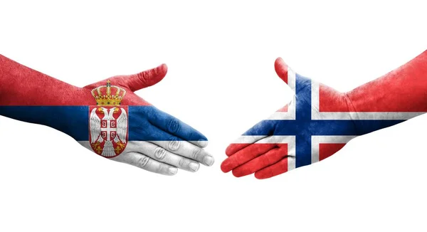 노르웨이와 세르비아의 국기가 손으로 그려지는 가운데 분리되어 이미지 — 스톡 사진
